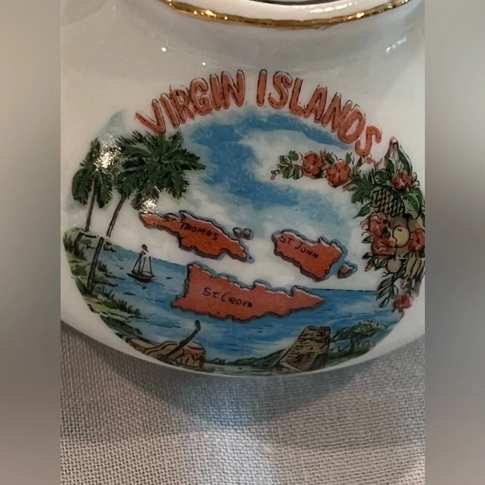 Miniature teapot, cup and saucer set
